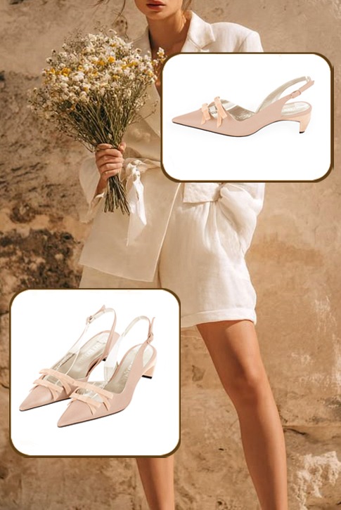 Women's powder pink elegant slingback heels, with a bow on the front. Pointed toe. Low comma heels - Worn view